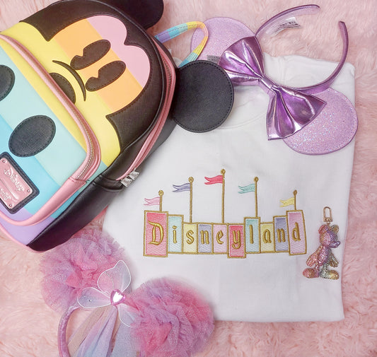 Pastel Disneyland sign sweatshirt by pixiedustgang